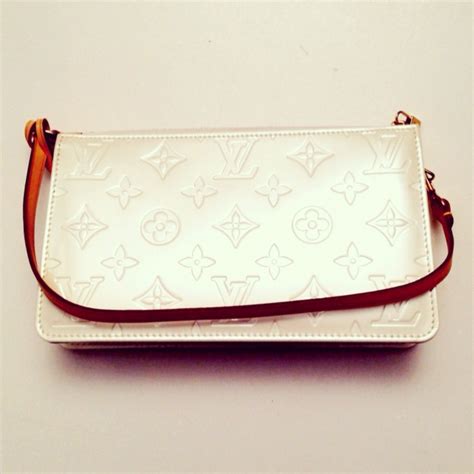 louis vuitton white clutch|louis vuitton clutch monogram.